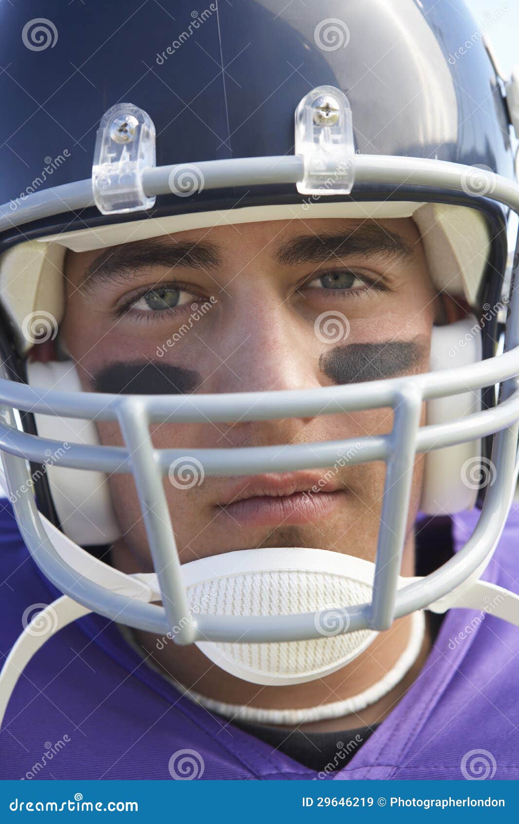 rugby-player-wearing-helmet-29646219.jpg